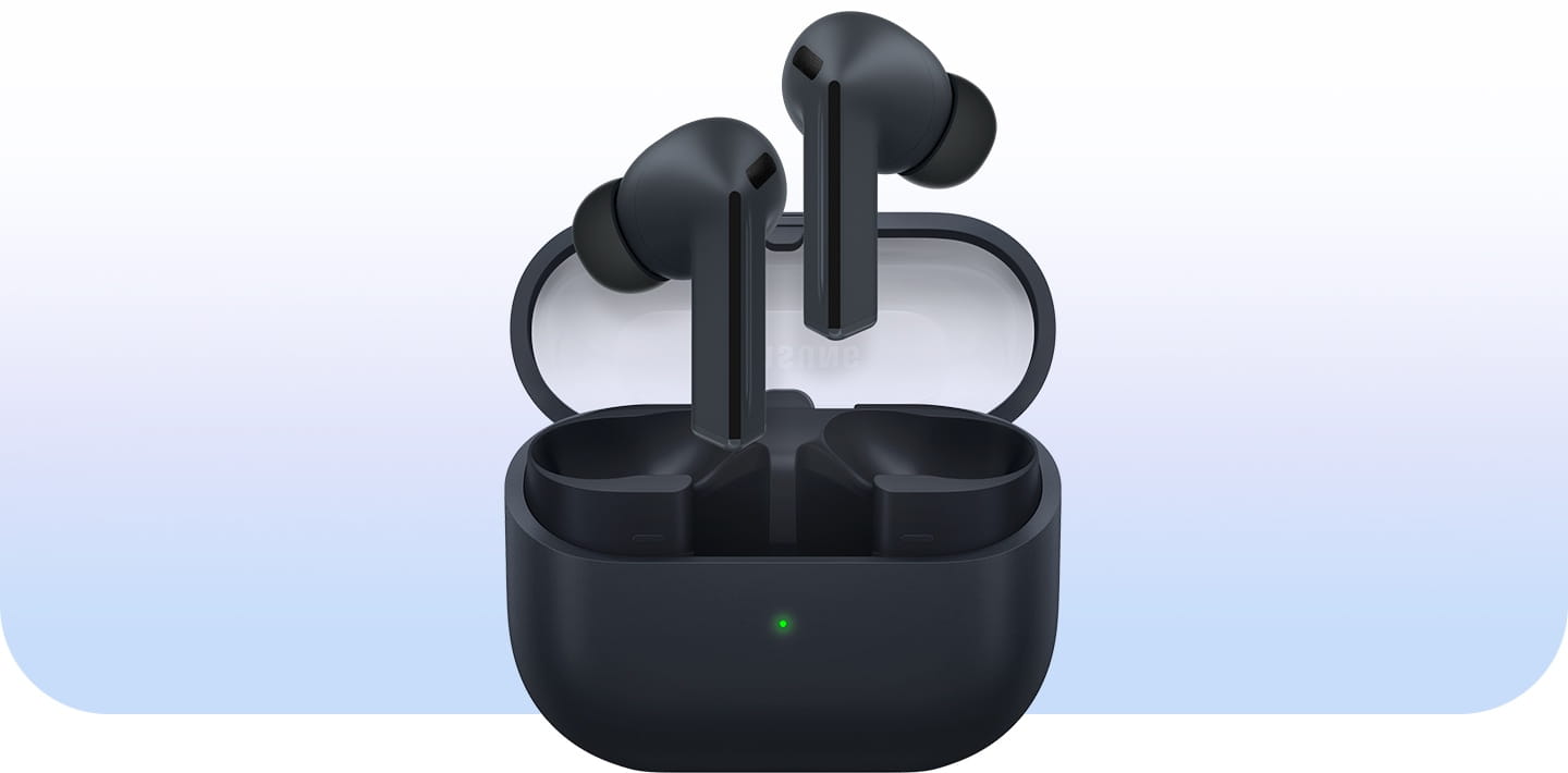 A pair of Black Galaxy Buds3 FE earbuds hovering above the open Galaxy Buds3 FE case.